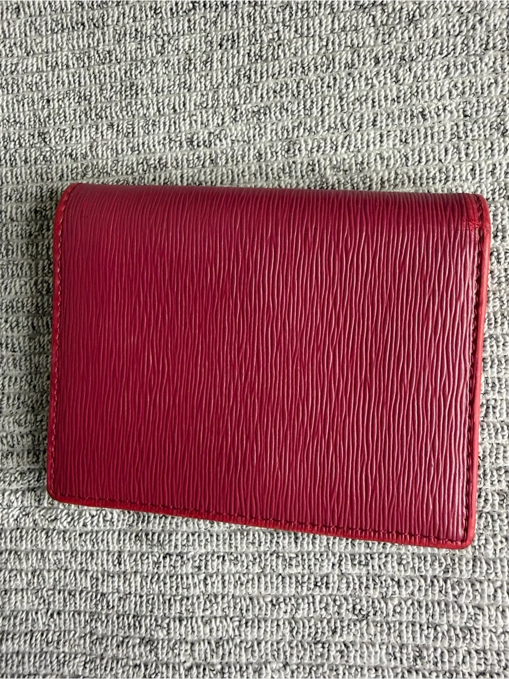 Authentic Prada Saffiano Leather Compact Wallet in deep red/berry/magenta color